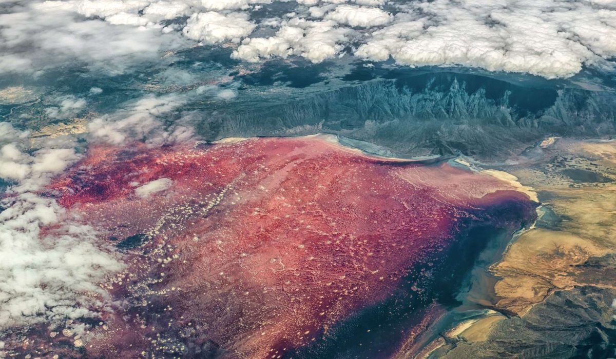 Aerial view of Lake Natron, found near Mount Kilimanjaro in Tanzania, with bright red color attributed to salt loving halophile organisms